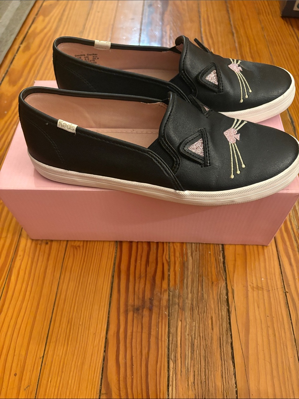 Keds Black Slip-On Sneakers with Pink & White Accents